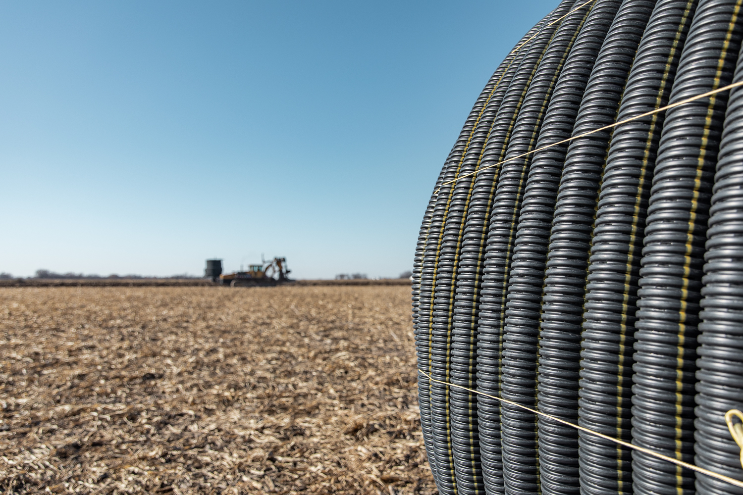 Farm Tile Tractor in Back